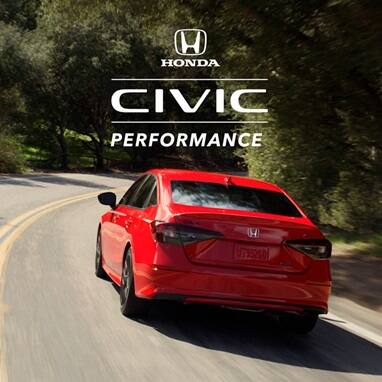 2027 Honda Civic Sedan Sport Touring Hybrid in Rallye Red back driving on a winding road through trees (Compact Sedan).